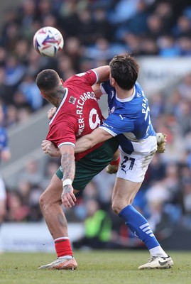 080325 - Chesterfield v Newport County - Sky Bet League 2 - Courtney Baker-Richardson of Newport and Ash Palmer of Chesterfield