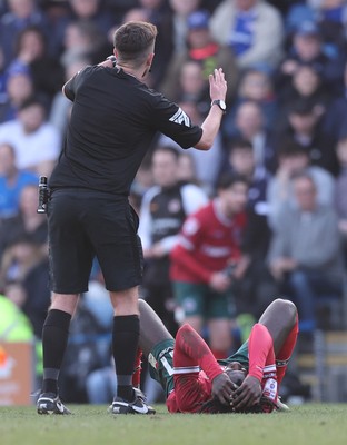 080325 - Chesterfield v Newport County - Sky Bet League 2 - Cameron Antwi of Newport with head injury in 2nd half