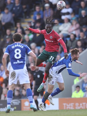 080325 - Chesterfield v Newport County - Sky Bet League 2 - Cameron Antwi of Newport and Tom Naylor of Chesterfield