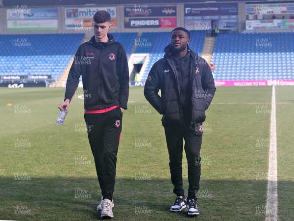 080325 - Chesterfield v Newport County - Sky Bet League 2 - Joe Thomas of Newport and David Ajiboye of Newport