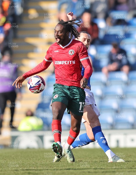 080325 - Chesterfield v Newport County - Sky Bet League 2 - Cameron Antwi of Newport and Ollie Banks of Chesterfield