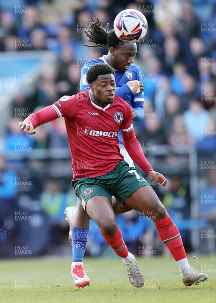 080325 - Chesterfield v Newport County - Sky Bet League 2 - Bobby Kamwa of Newport and Ryheem Sheckleford of Chesterfield