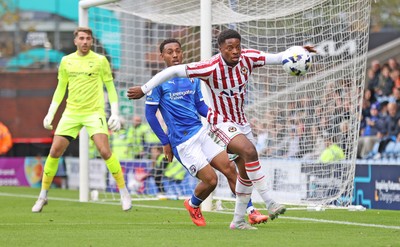 270925 - Chesterfield v Newport County - Sky Bet League 2 - Bobby Kamwa of Newport and Lewis Gordon of Chesterfield in goalmouth