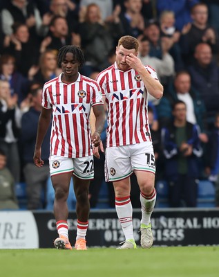 270925 - Chesterfield v Newport County - Sky Bet League 2 - Lee Jenkins of Newportlooks dejected as Newport let in goal With Habeeb Ogunneye of Newport