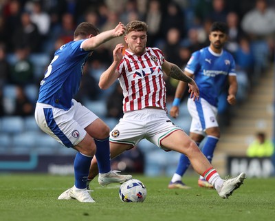 270925 - Chesterfield v Newport County - Sky Bet League 2 - Cameron Evans of Newport and John Fleck of Chesterfield