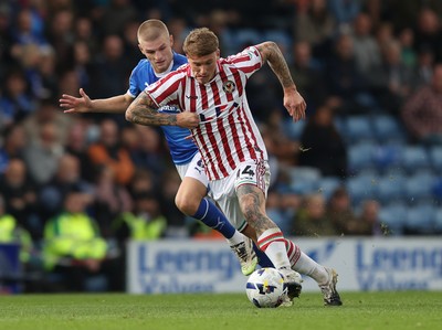 270925 - Chesterfield v Newport County - Sky Bet League 2 - Kai Whitmore of Newport and Ryan Stirk of Chesterfield