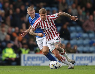 270925 - Chesterfield v Newport County - Sky Bet League 2 - Kai Whitmore of Newport and Ryan Stirk of Chesterfield