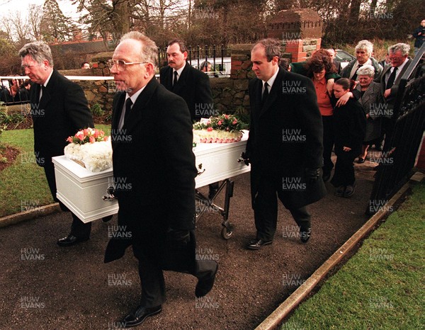 170395 - Claire Hood Funeral - Friends watch as the coffin leaves chapel service