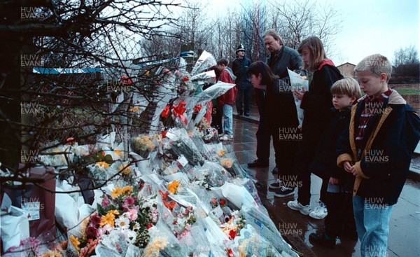 220195 - Claire Hood - Friends of murdered girl Claire Hood place flowers near the scene of the murder