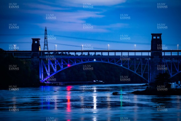 230420 - Clap for Carers - Britannia Bridge on Anglesey, North Wales being lit up blue in support of NHS Staff