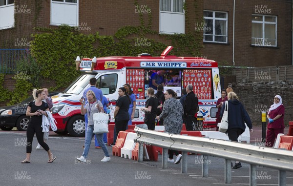 230420 - Picture shows an ice cream van outside the Royal Gwent Hospital, Newport taking part in a clap for carers workers during the coronavirus (covid-19) lockdown