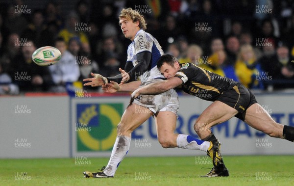 16.01.10 - Clermont Auvergne v Ospreys - Heineken Cup - Aurelien Rougerie of Clermont Auvergne is tackled by Tommy Bowe of Ospreys. 