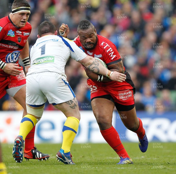 180513 - ASM Clermont Auvergne v Toulon - Heineken Cup Final - Mathieu Bastareaud is tackled by Thomas Domingo of Clermont 