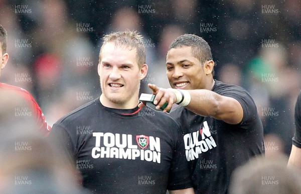 180513 - ASM Clermont Auvergne v Toulon - Heineken Cup Final - Gethin Jenkins and Delon Armitage of Toulon share a joke while they celebrate victory 