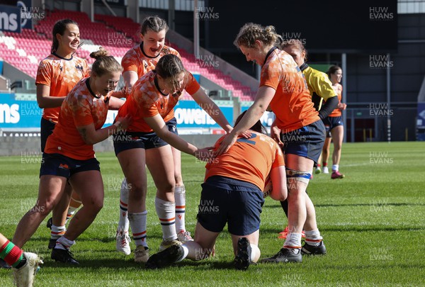 030324 - Clovers v Edinburgh Rugby, Celtic Challenge - Briar McNamara of Edinburgh is congratulated by team mates after she races over to score try