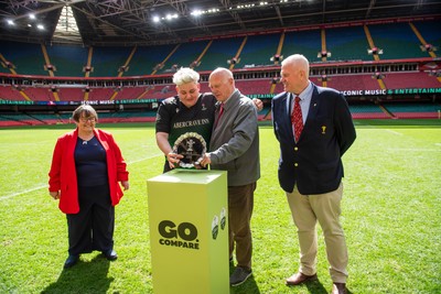 180426 - Clwb Rygbi Cymry Caerdydd v Seven Sisters - WRU Women's National Plate -  Seven Sisters captain Bethan Howell of Seven Sisters is presented with the plate by Terry Cobner