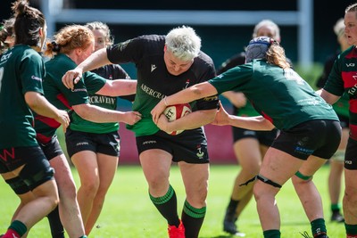 180426 - Clwb Rygbi Cymry Caerdydd v Seven Sisters - WRU Women's National Plate - Bethan Howell of Seven Sisters is tackled by Laura Satterly of Clwb Rygbi Cymry Caerdydd
