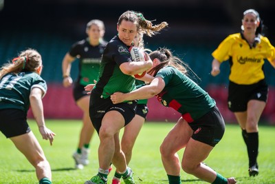 180426 - Clwb Rygbi Cymry Caerdydd v Seven Sisters - WRU Women's National Plate - Melissa Gnojek of Seven Sisters is tackled by Rhi Gower of Clwb Rygbi Cymry Caerdydd