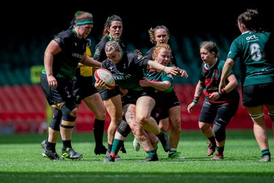 180426 - Clwb Rygbi Cymry Caerdydd v Seven Sisters - WRU Women's National Plate - Caris Llewellyn of Seven Sisters is tackled by Elin Davies of Clwb Rygbi Cymry Caerdydd