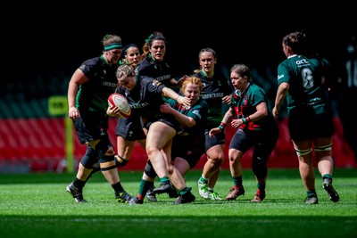 180426 - Clwb Rygbi Cymry Caerdydd v Seven Sisters - WRU Women's National Plate - Caris Llewellyn of Seven Sisters is tackled by Elin Davies of Clwb Rygbi Cymry Caerdydd