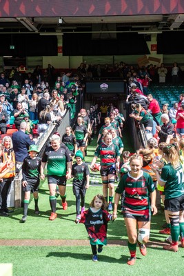 180426 - Clwb Rygbi Cymry Caerdydd v Seven Sisters - WRU Women's National Plate - Players run on to the pitch past the trophy