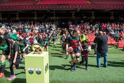 180426 - Clwb Rygbi Cymry Caerdydd v Seven Sisters - WRU Women's National Plate - Players run on to the pitch past the trophy