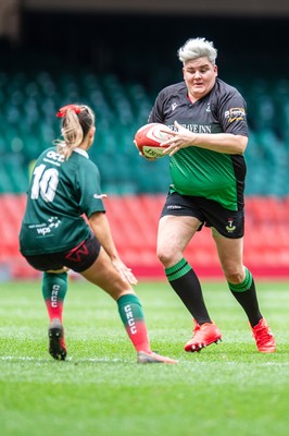 180426 - Clwb Rygbi Cymry Caerdydd v Seven Sisters - WRU Women's National Plate - Bethan Howell of Seven Sisters takes on Alaw Hughes of Clwb Rygbi Cymry Caerdydd