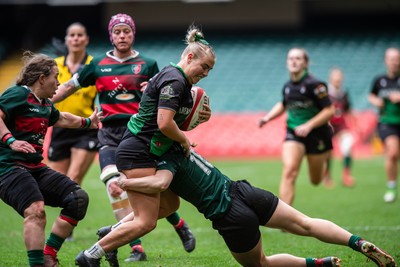 180426 - Clwb Rygbi Cymry Caerdydd v Seven Sisters - WRU Women's National Plate - Heledd Lewis of Seven Sister is tackled by Mirian Jones of Clwb Rygbi Cymry Caerdydd