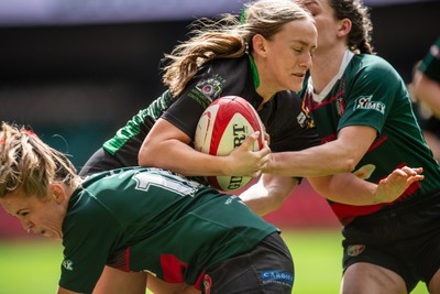 180426 - Clwb Rygbi Cymry Caerdydd v Seven Sisters - WRU Women's National Plate - Holly Cooper of Seven Sisters is tackled by Alaw Hughes of Clwb Rygbi Cymry Caerdydd and Rhi Gower of Clwb Rygbi Cymry Caerdydd