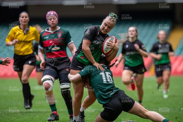180426 - Clwb Rygbi Cymry Caerdydd v Seven Sisters - WRU Women's National Plate - Heeled Lewis of Seven Sisters is tackled by Morgan Hodgkins of Clwb Rygbi Cymry Caerdydd