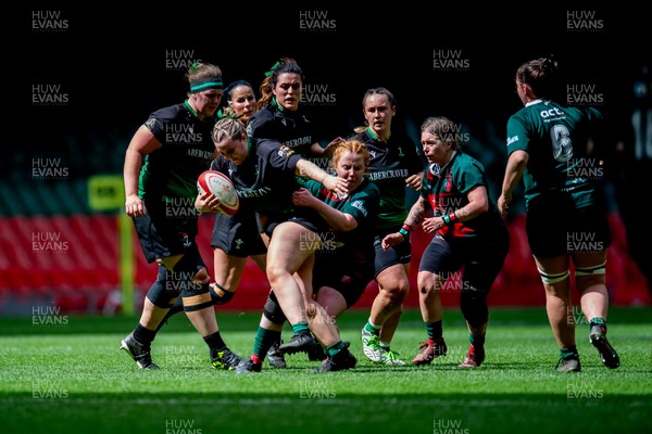 180426 - Clwb Rygbi Cymry Caerdydd v Seven Sisters - WRU Women's National Plate - Caris Llewellyn of Seven Sisters is tackled by Elin Davies of Clwb Rygbi Cymry Caerdydd