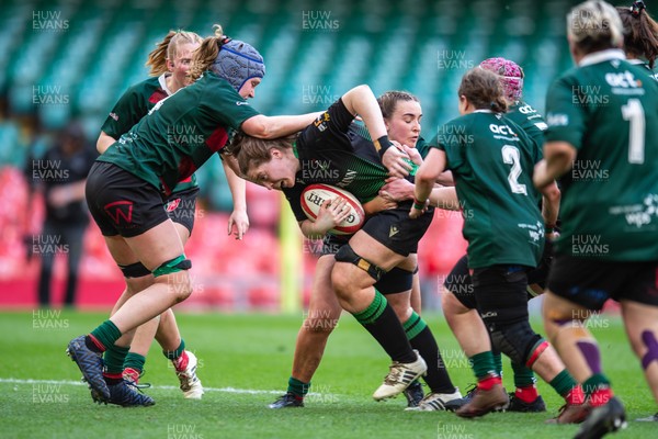 180426 - Clwb Rygbi Cymry Caerdydd v Seven Sisters - WRU Women's National Plate - Poppy Thomson of Seven Sisters is tackled by Laura Satterly of Clwb Rygbi Cymry Caerdydd