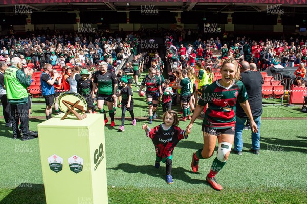 180426 - Clwb Rygbi Cymry Caerdydd v Seven Sisters - WRU Women's National Plate - Players run on to the pitch past the trophy