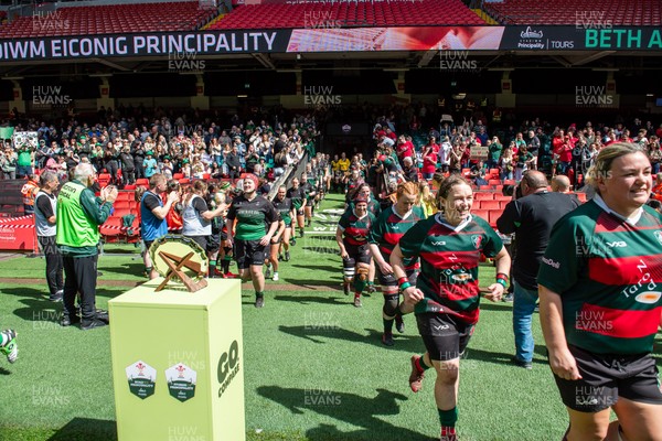 180426 - Clwb Rygbi Cymry Caerdydd v Seven Sisters - WRU Women's National Plate - Players run on to the pitch past the trophy