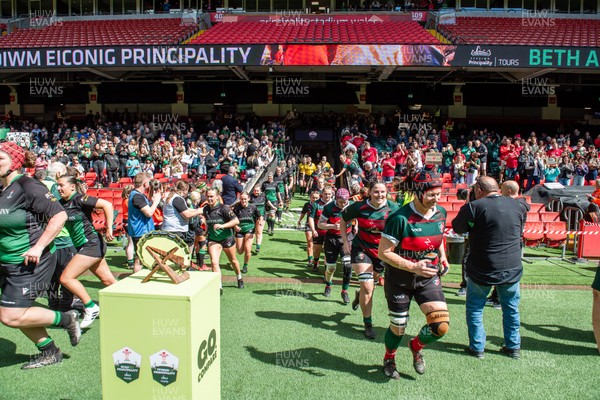 180426 - Clwb Rygbi Cymry Caerdydd v Seven Sisters - WRU Women's National Plate - Players run on to the pitch past the trophy