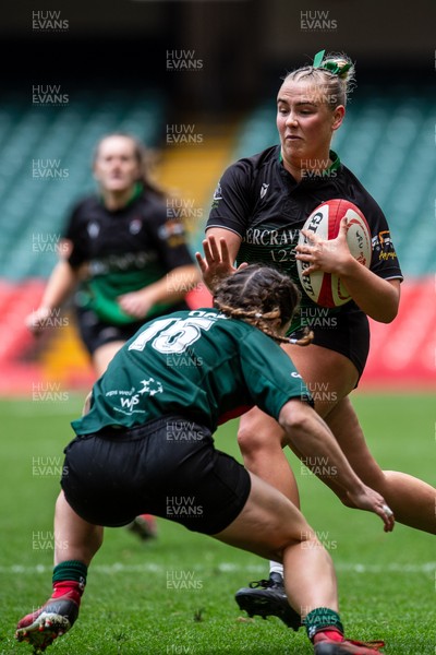 180426 - Clwb Rygbi Cymry Caerdydd v Seven Sisters - WRU Women's National Plate - Heledd Lewis of Seven Sister is tackled by Mirian Jones of Clwb Rygbi Cymry Caerdydd