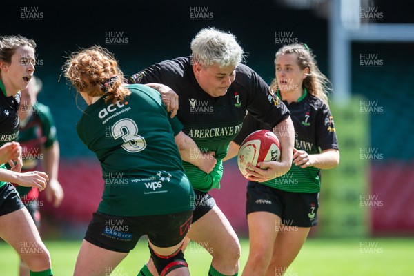 180426 - Clwb Rygbi Cymry Caerdydd v Seven Sisters - WRU Women's National Plate - Bethan Howell of Seven Sisters is tackled by Elin Davies of Clwb Rygbi Cymry Caerdydd