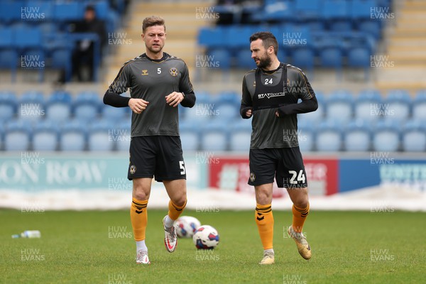 010423 - Colchester United v Newport County - Sky Bet League 2 - James Clarke and Aaron Wildig of Newport County during the warm up