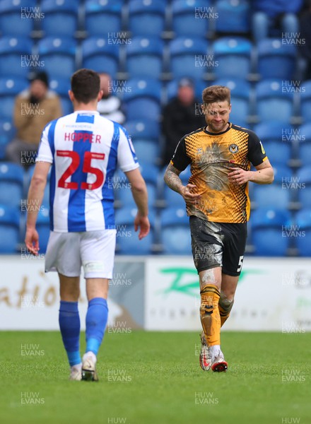 010423 - Colchester United v Newport County - Sky Bet League 2 - A muddy James Clarke of Newport County