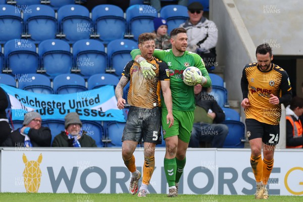 010423 - Colchester United v Newport County - Sky Bet League 2 - Joe Day with James Clarke of Newport County