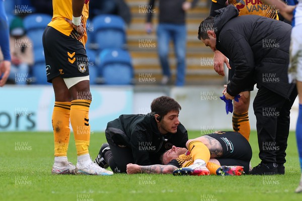 010423 - Colchester United v Newport County - Sky Bet League 2 - Scot Bennet of Newport County receives treatment for a head injury