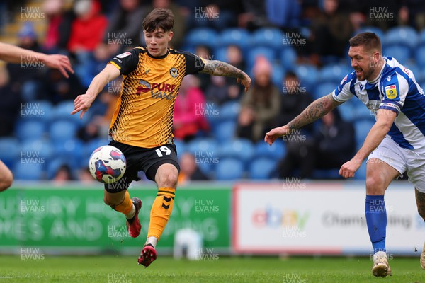010423 - Colchester United v Newport County - Sky Bet League 2 - Charlie McNeill of Newport County takes on Luke Chambers of Colchester United