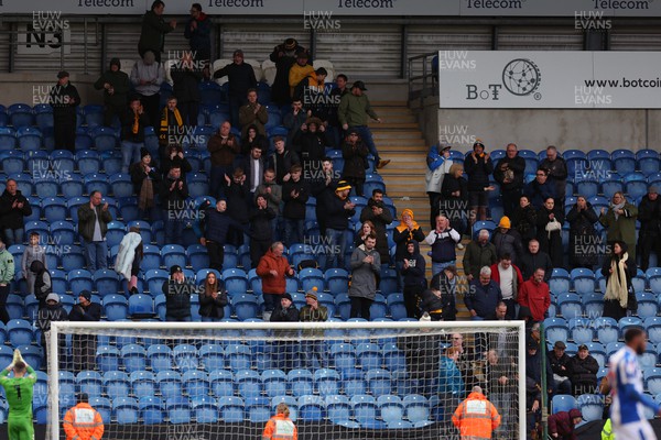 010423 - Colchester United v Newport County - Sky Bet League 2 - The Newport County fans at full time