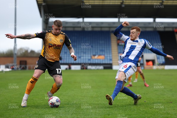 010423 - Colchester United v Newport County - Sky Bet League 2 - Scot Bennett of Newport County is under pressure from Arthur Read of Colchester United