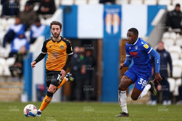 060321 - Colchester United v Newport County - Sky Bet League 2 - Josh Sheehan of Newport County and Junior Tchamadeu of Colchester United