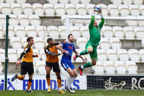 060321 - Colchester United v Newport County - Sky Bet League 2 - Nick Townsend of Newport County gathers up the ball 