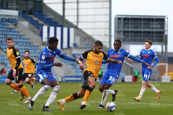 060321 - Colchester United v Newport County - Sky Bet League 2 - Joss Labadie of Newport County in action with Miles Welch-Hayes (L) and Junior Tchamadeu (R) of Colchester United