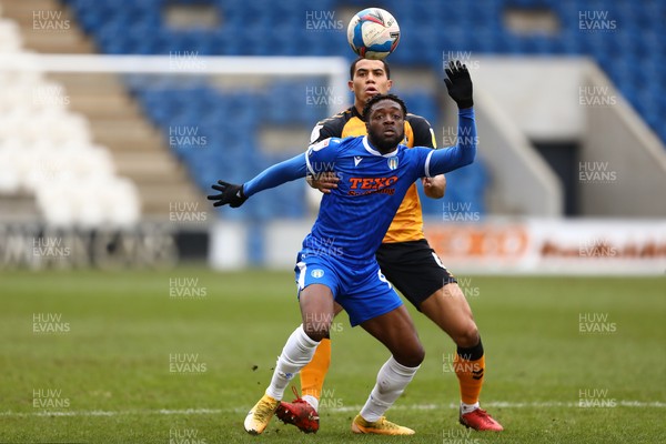 060321 - Colchester United v Newport County - Sky Bet League 2 - Aramide Oteh of Colchester United and Priestley Farquharson of Newport County