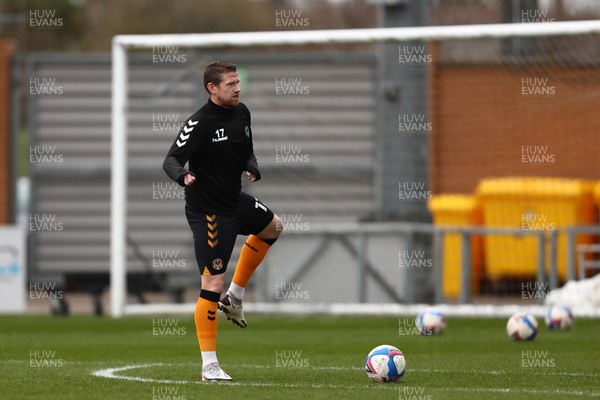 060321 - Colchester United v Newport County - Sky Bet League 2 - Scot Bennett of Newport County warms up
