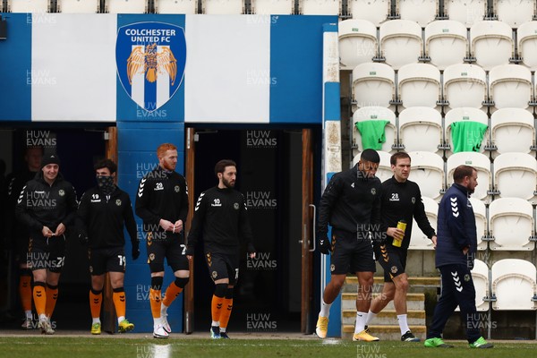 060321 - Colchester United v Newport County - Sky Bet League 2 - Newport County players emerge from the tunnel to warm up
